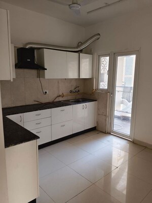 Kitchen in 3 BHK Apartment at Samridhi Luxuriya Avenue, Sector 150 – for Rent