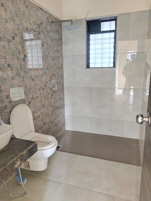 Bathroom in 2.5 BHK Apartment at Dosti Desire, Brahmand – for Rent