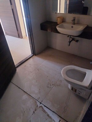 Bathroom in 2.5 BHK Apartment at Dosti Desire, Brahmand – for Rent