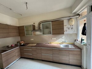 Kitchen in 3 BHK Apartment at Aba Corp Orange County Tower 16, Ahinsa Khand 1 – for Rent