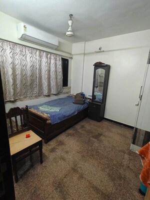 Bedroom in 2 BHK Apartment at Jyoti Complex, Goregaon East – for Rent