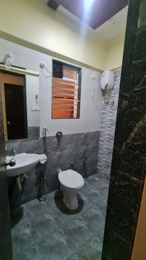 Bathroom in 2 BHK Apartment at Mahavir Kalpavruksha, Ghodbunder Road – for Sale