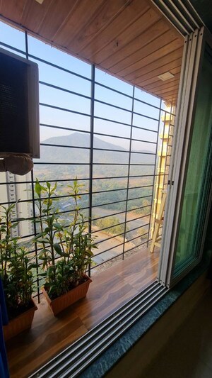 Balcony in 2 BHK Apartment at Mahavir Kalpavruksha, Ghodbunder Road – for Sale