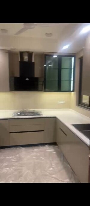 Kitchen in 4 BHK Builder Floor at Ansal Sushant Lok I, Sector 43 – for Sale
