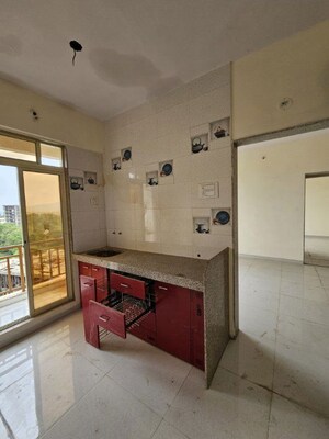 Kitchen in 1 BHK Apartment at Shree Samruddhi Heights, Bapgaon – for Sale