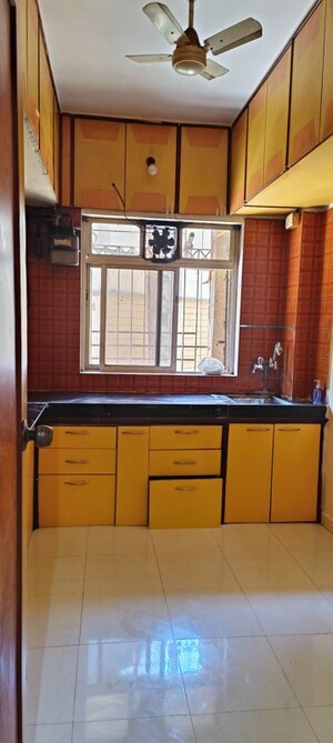Kitchen in 1 BHK Apartment at Krishna Greenland Park Vastu Federation, Ghodbunder Road – for Rent