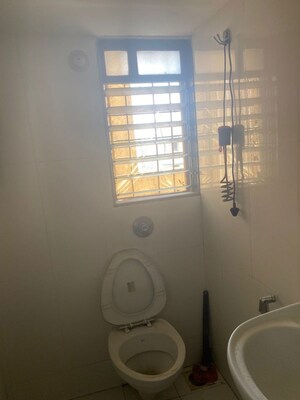 Bathroom in 1 BHK Apartment at Puranik Rumah Bali, Ghodbunder Road – for Rent