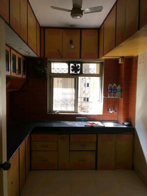 Kitchen in 1 BHK Apartment at Krishna Greenland Park Vastu Federation, Ghodbunder Road – for Sale