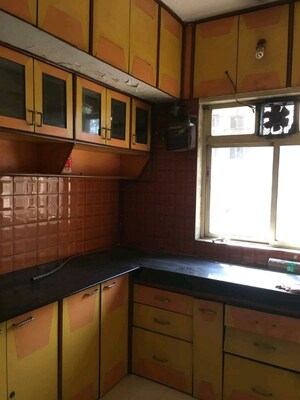 Kitchen in 1 BHK Apartment at Krishna Greenland Park Vastu Federation, Ghodbunder Road – for Sale