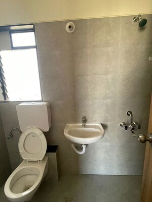 Bathroom in 1 BHK Apartment at Puranik Aarambh, Ghodbunder Road – for Rent