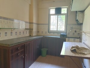 Kitchen in 2 BHK Apartment at Atlanta CHS, Malad West – for Rent