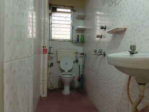 Bathroom in 2 BHK Apartment at Atlanta CHS, Malad West – for Rent