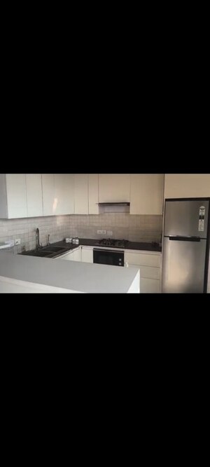 Kitchen in 3 BHK Apartment at Supertech Supernova Nova Residences, Sector 94 – for Rent