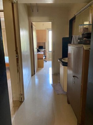 Kitchen in 3 BHK Apartment at Vyas Anudatta CHS, Rambaug Colony – for Rent