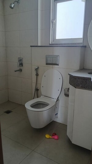 Attached Bathroom in 4 BHK Apartment at Godrej Woods, Sector 43 – for Rent