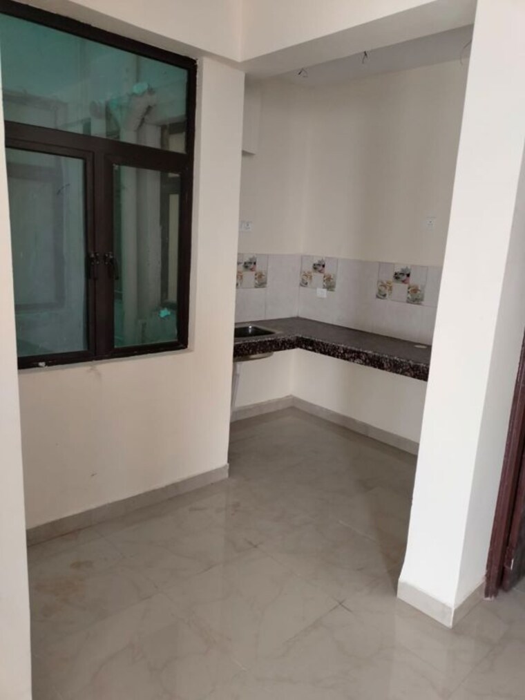 Kitchen, crossing republic 2 Bedroom 1022 Sq.Ft. Apartment In Crossing Republic Ghaziabad 10237170