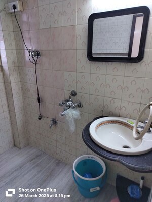 Bathroom in 2 BHK Apartment at Riddhi Garden, Malad East – for Rent