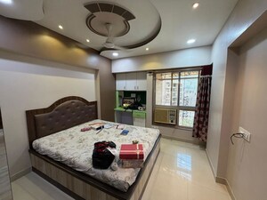 Bedroom in 2 BHK Apartment at Kanakia Spaces Niharika, Manpada – for Rent
