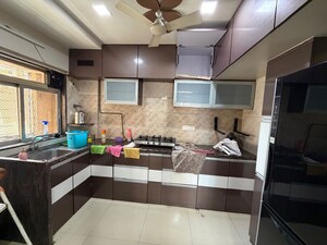 Kitchen in 2 BHK Apartment at Kanakia Spaces Niharika, Manpada – for Rent