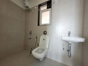 Bathroom in 1 BHK Apartment at Raunak Heights, Ghodbunder Road – for Rent