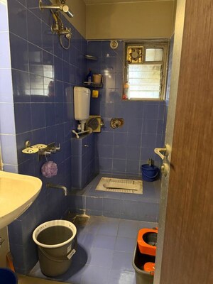 Bathroom in 2 BHK Apartment at Kanakia Spaces Niharika, Manpada – for Rent
