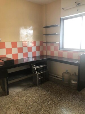 Kitchen in 2 BHK Apartment at Guru Ganesh Nagar Society, Kothrud – for Rent