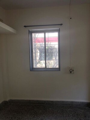 Bedroom in 2 BHK Apartment at Guru Ganesh Nagar Society, Kothrud – for Rent