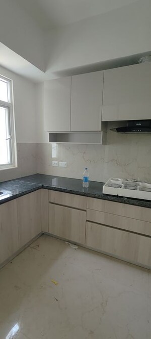 Kitchen in 3 BHK Apartment at Smart World Orchard, Sector 61 – for Rent