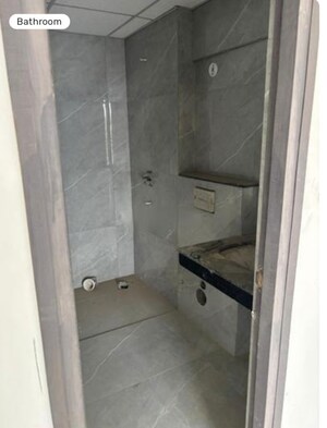 Bathroom in 3 BHK Apartment at Rishita Manhattan, Gomti Nagar – for Sale