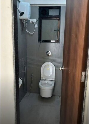 Bathroom in 1.5 BHK Apartment at Puneet Shivalaya, Tagore Nagar – for Rent