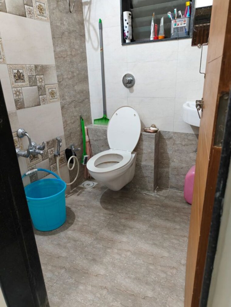 Bathroom, utsav-elegance 2 Bedroom 1200 Sq.Ft. Apartment In Memnagar Ahmedabad 10237632