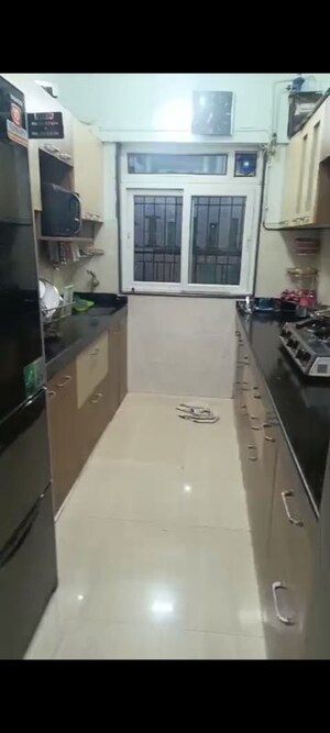 Kitchen in 2 BHK Apartment at Rustomjee Urbania, Thane West – for Sale