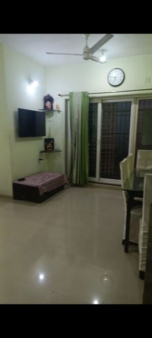 Living Room in 2 BHK Apartment at Rustomjee Urbania, Thane West – for Sale