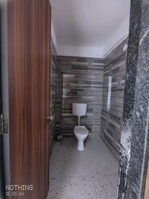 Bathroom in 2 BHK Apartment at Sai Landmark, Thergaon – for Sale