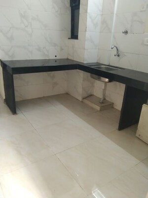 Kitchen in 1 BHK Apartment at Jagrut CHS, Gokhalenagar – for Rent