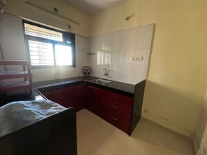 Kitchen in 2 BHK Apartment at Unnathi Woods Phase 3, Ghodbunder Road – for Rent