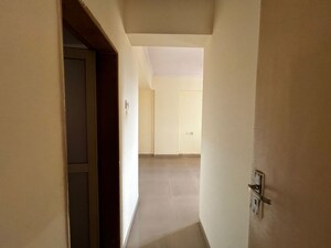 Building Lobby in 2 BHK Apartment at Puranik Hometown, Ghodbunder Road – for Rent