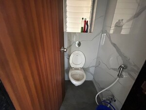 Bathroom in 1 BHK Apartment at Raunak Bliss B1, Ghodbunder Road – for Rent