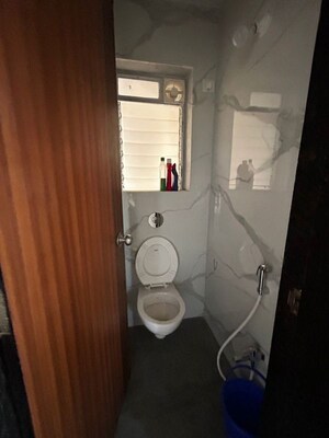 Bathroom in 1 BHK Apartment at Raunak Bliss B1, Ghodbunder Road – for Rent