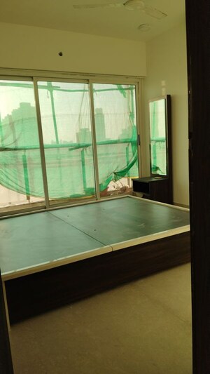 Bedroom in 3 BHK Apartment at Omkar Vayu, Mahim – for Sale