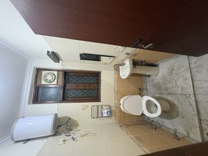 Bathroom in 2 BHK Builder Floor at Kalkaji – for Rent