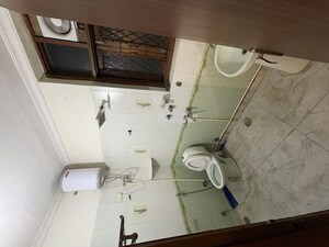 Bathroom in 2 BHK Builder Floor at Kalkaji – for Rent