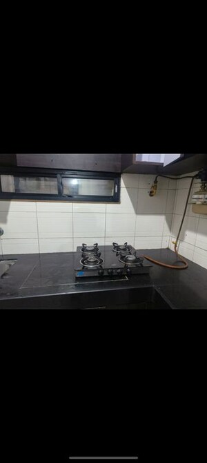 Kitchen in 2 BHK Apartment at Manav Silver Skyscapes, Wakad – for Rent