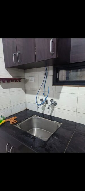 Kitchen in 2 BHK Apartment at Manav Silver Skyscapes, Wakad – for Rent