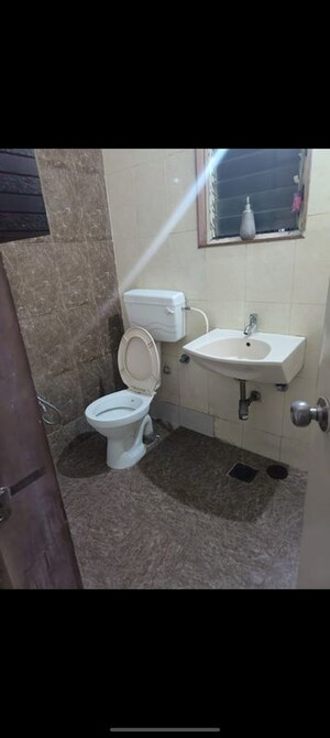 Bathroom in 2 BHK Apartment at Manav Silver Skyscapes, Wakad – for Rent