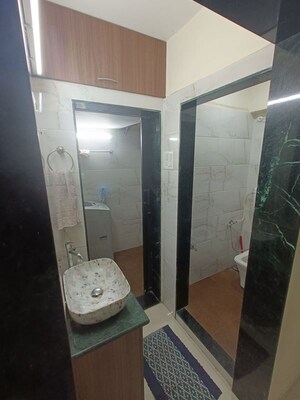 Bathroom in 1 BHK Apartment at Hill Garden CHS, Kokanipada – for Rent