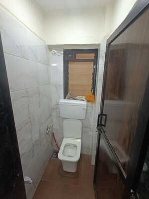 Bathroom in 1 BHK Apartment at Hill Garden CHS, Kokanipada – for Rent