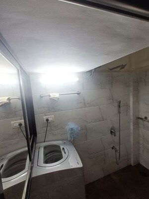 Bathroom in 1 BHK Apartment at Hill Garden CHS, Kokanipada – for Rent