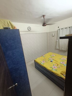 Bedroom in 1 BHK Apartment at Hill Garden CHS, Kokanipada – for Rent