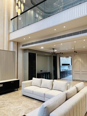 Living Room in 6+ BHK Villa at Bhavya Corporate Towers, Vibhuti Khand – for Sale